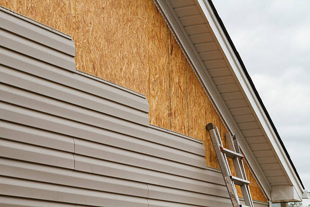 Professional Siding Contractor technician working in Lawrence, IN